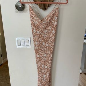 Cute and versatile RESA midi dress. Wore once to wedding. Adjustable tie in back